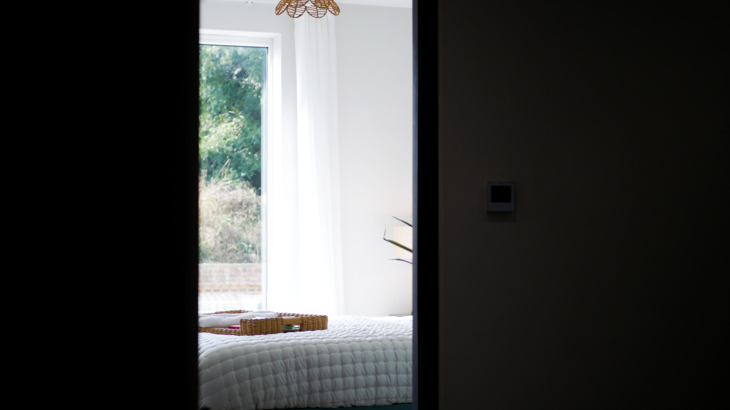 Bedroom view through doorway, Cautley House show home